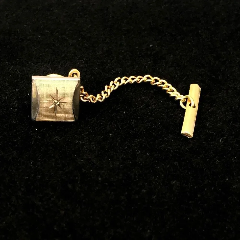 vintage mcm swank gold tone‎ starburst with textured background tie tac